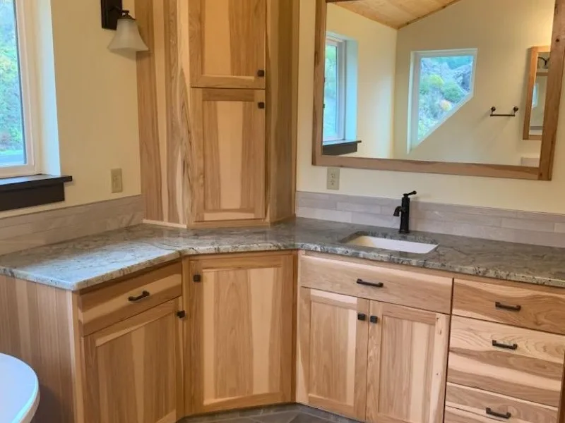 Master bath remodel with custom hickory vanities and slate tile floor