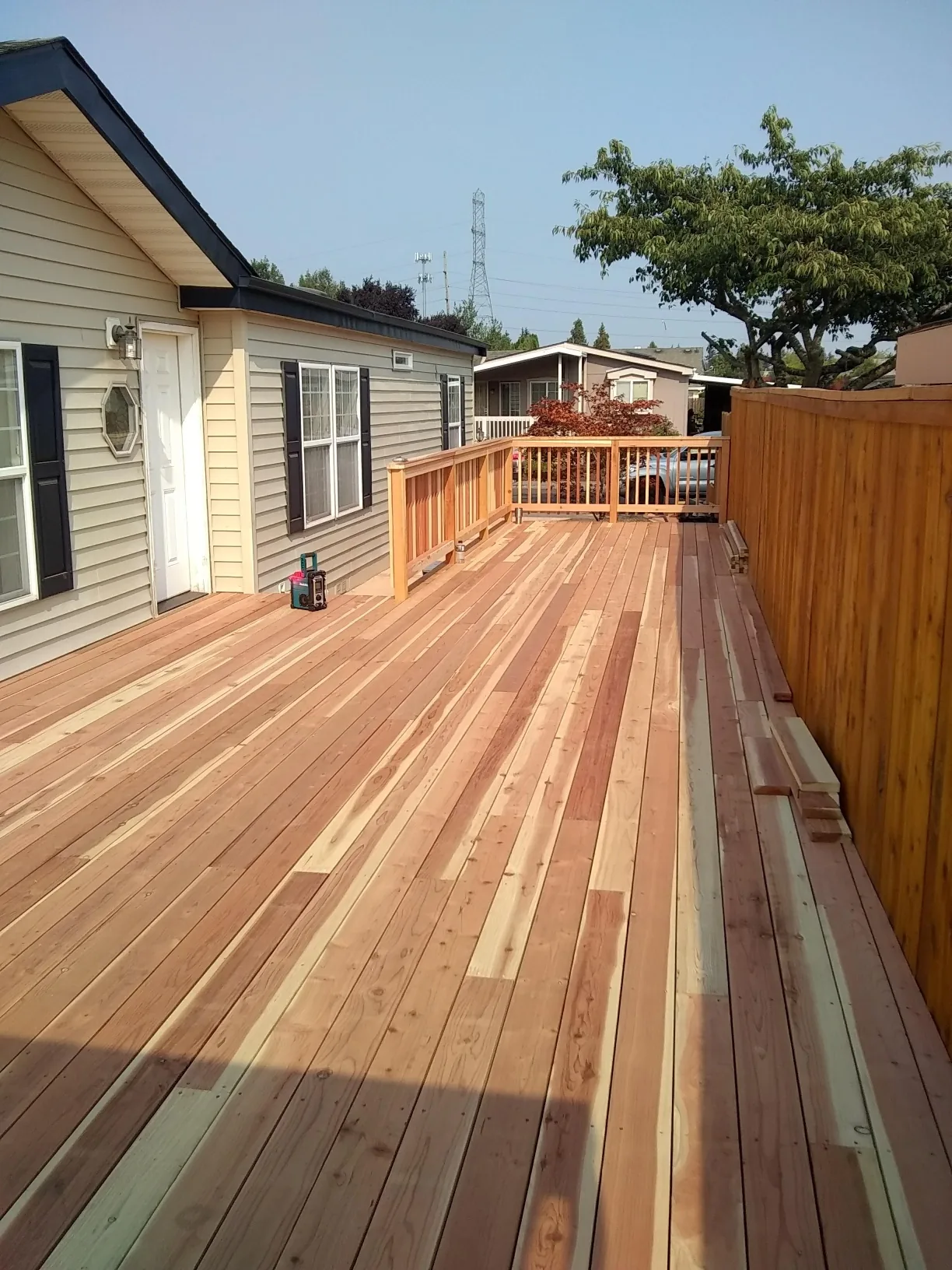 Cedar deck installation in progress by OJEG Construction