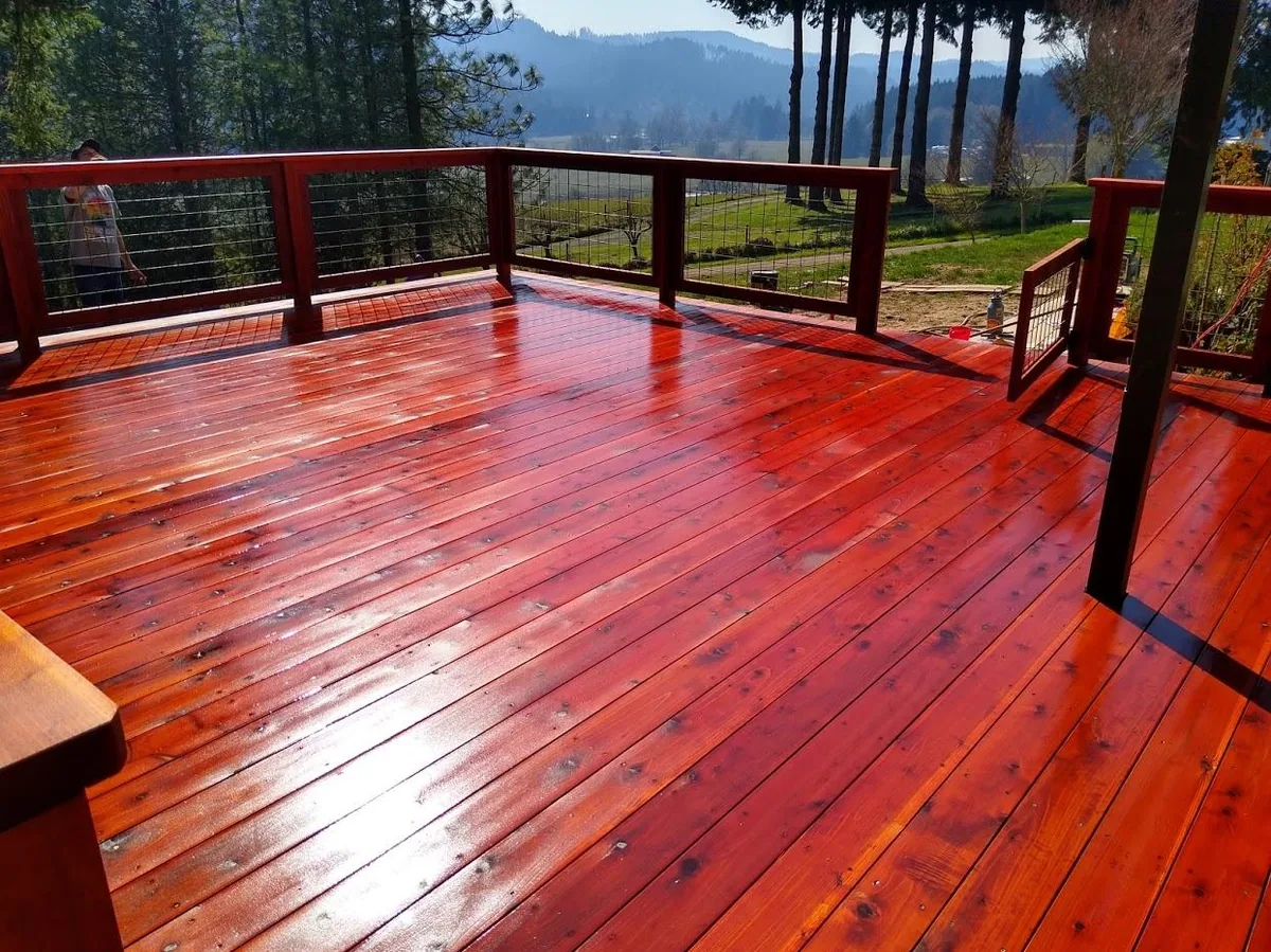 Red-stained cedar deck built by OJEG Construction